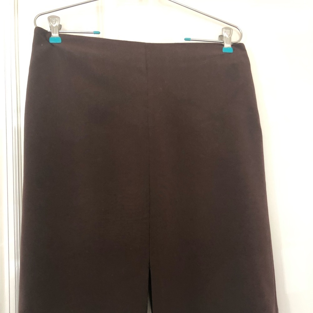 Brown skirt with slits in the center.